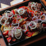 Свинина запеченная с овощами